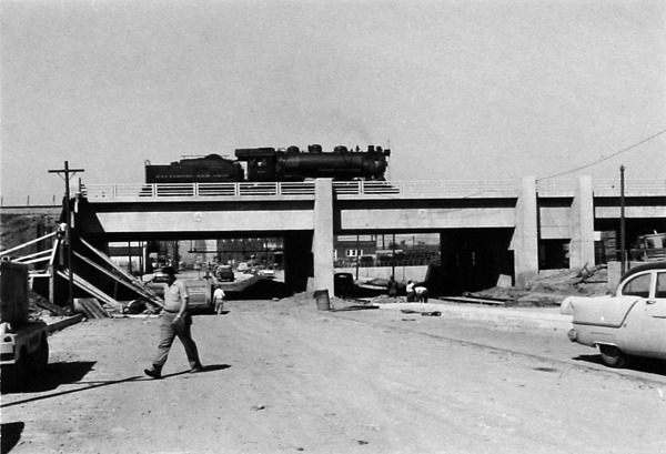 Locomotive over elevated track 1957